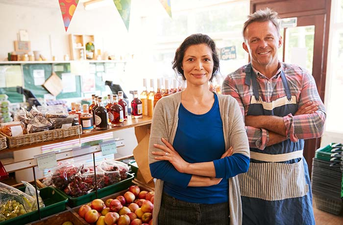 Man and Woman running a general store