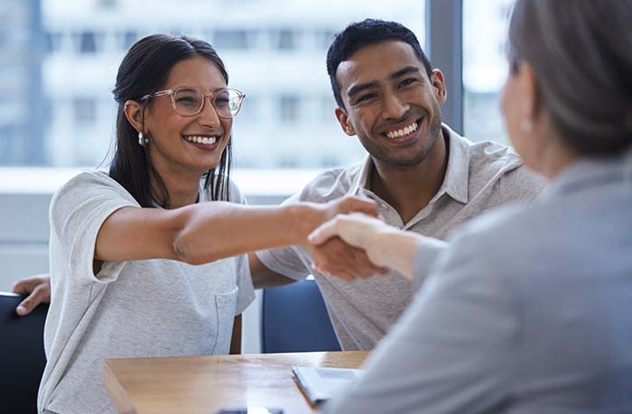 handshake at loan closing